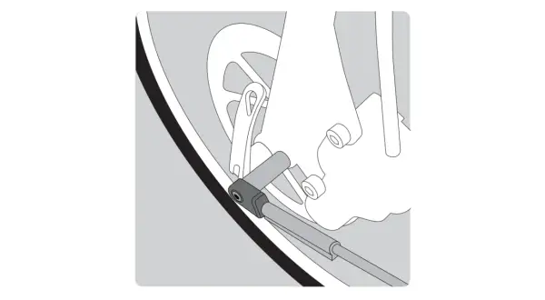 Détail d'un vélo : le support garde boue est fixé à la fourche, près de la roue.