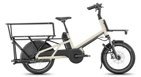 Vélo cargo électrique Moustache, idéal pour transporter vos affaires. Vérifiez la pression pneu vélo électrique moustache pour un trajet optimal.