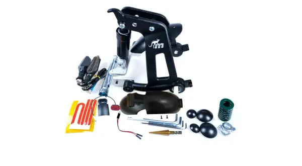 Ensemble de pièces détachées pour Kuickwheel S1-C Pro : support, amortisseur, clignotants, et outils.