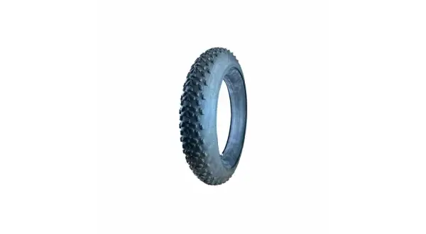 Gros pneu fat bike 24 pouces avec crampons agressifs, prêt pour l'aventure sur tous terrains.
